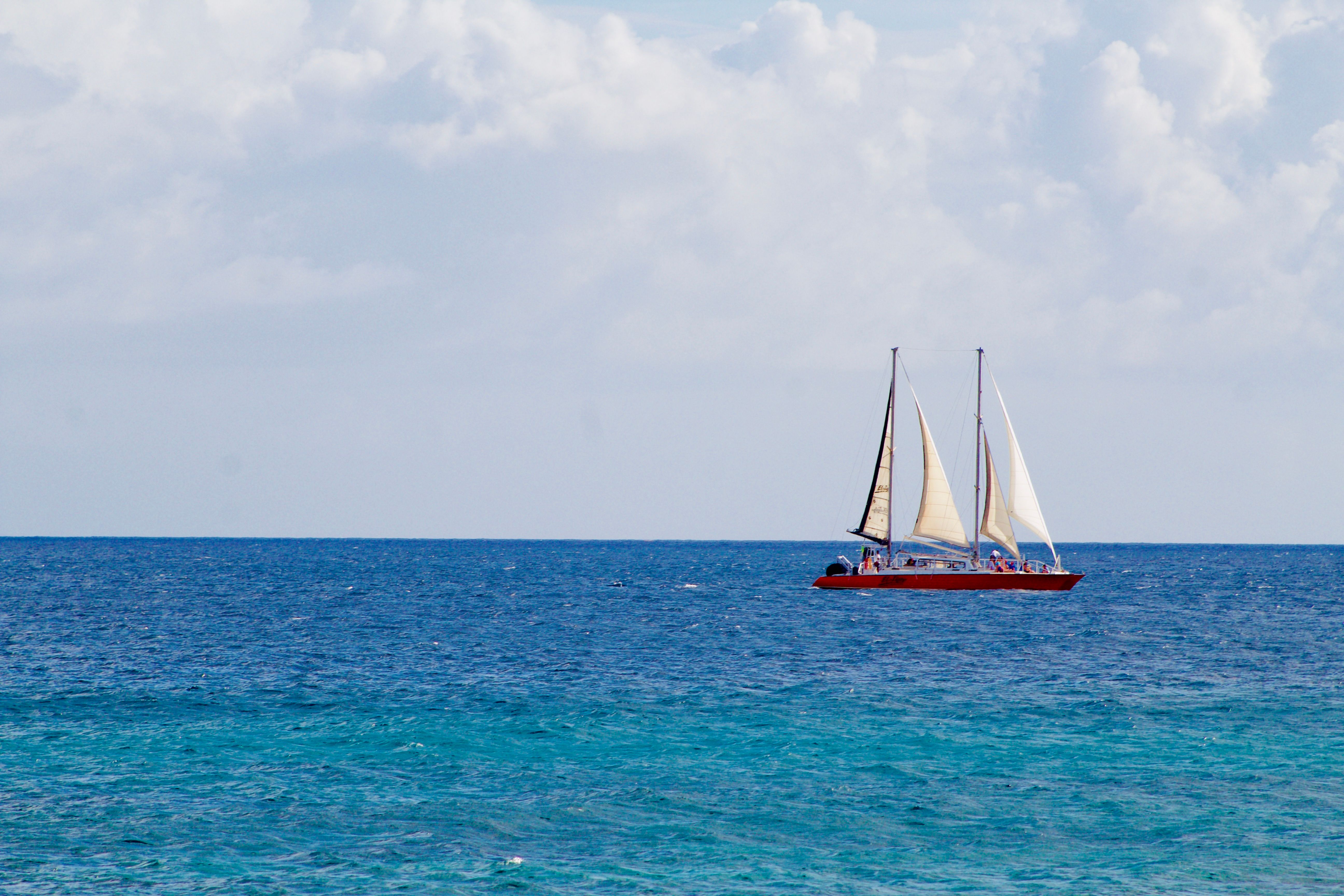 Best 4 Hours 34ft Day Dream Private Charter in Nassau Review: Your Ultimate Bahamas Adventure Awaits Review 2026 - A stunning sailboat glides across the blue ocean under a bright sky.