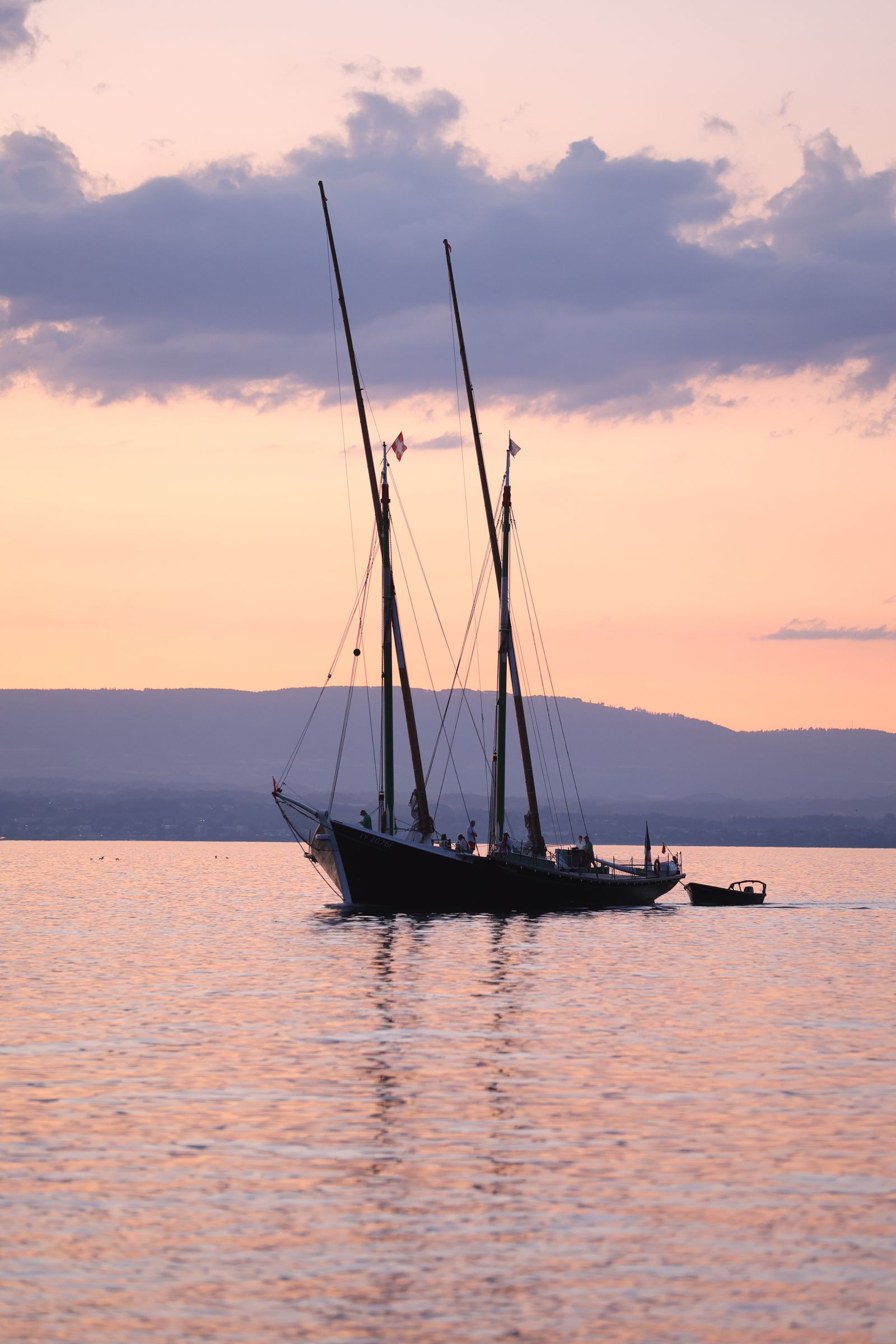 Évian-les-Bains lakefront with Alps across Lake Geneva at sunset