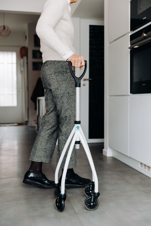 Kitchen Walker Senior using a walker in a modern kitchen · Free Stock Photo