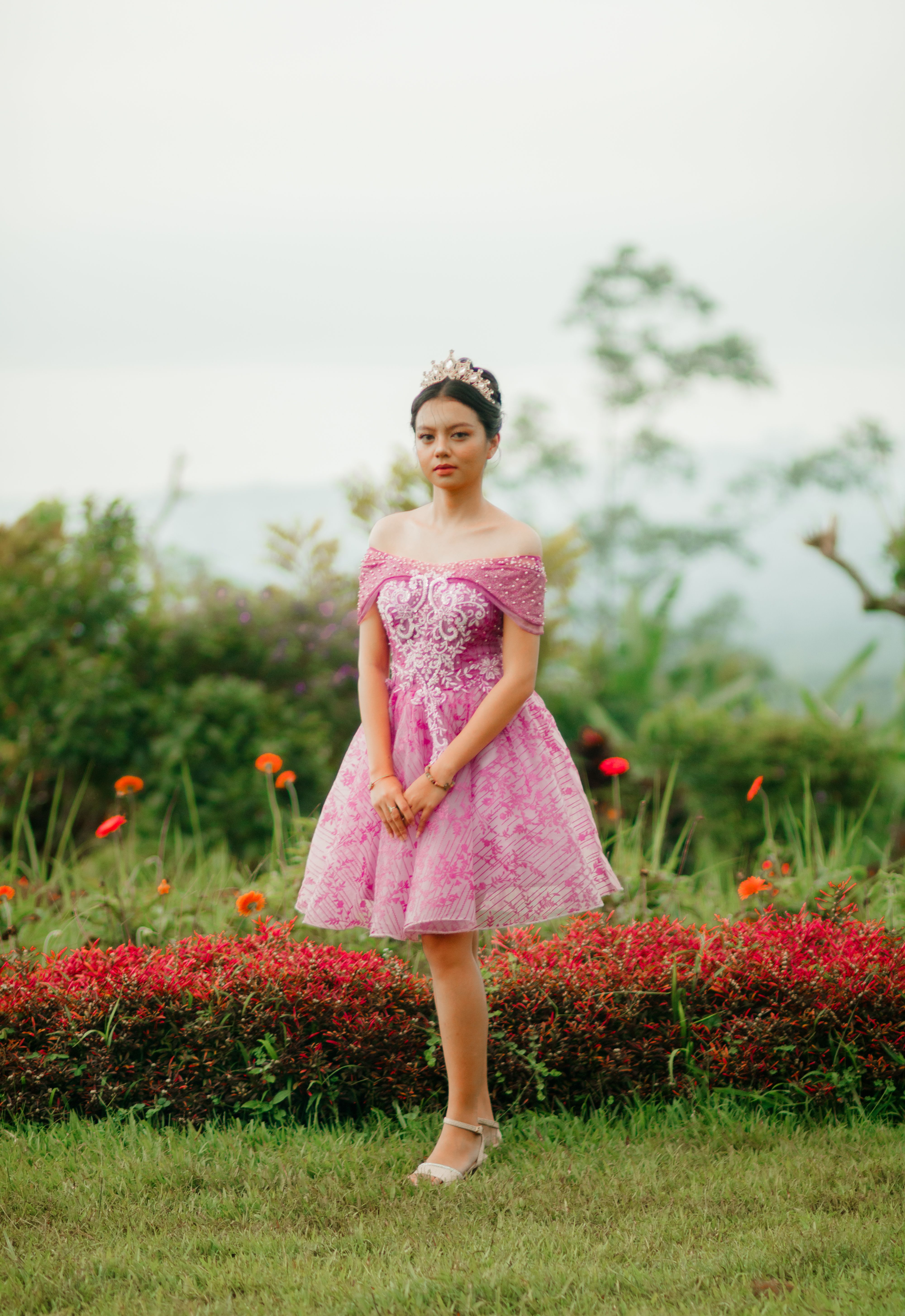 Elegant Young Woman in Pink Dress Outdoors · Free Stock Photo