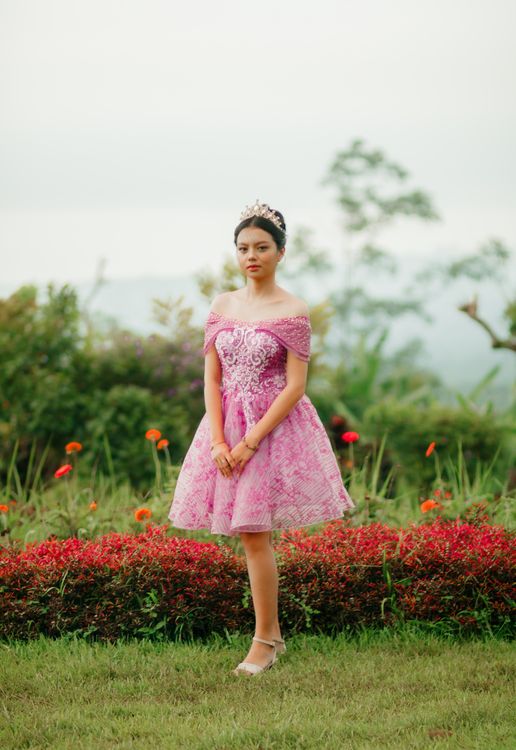 Elegant Young Woman in Pink Dress Outdoors · Free Stock Photo