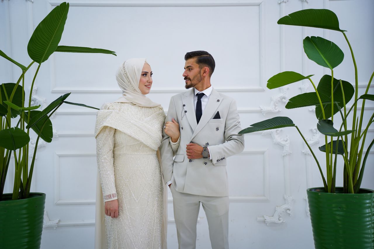 Elegant wedding couple in a luxurious indoor setting