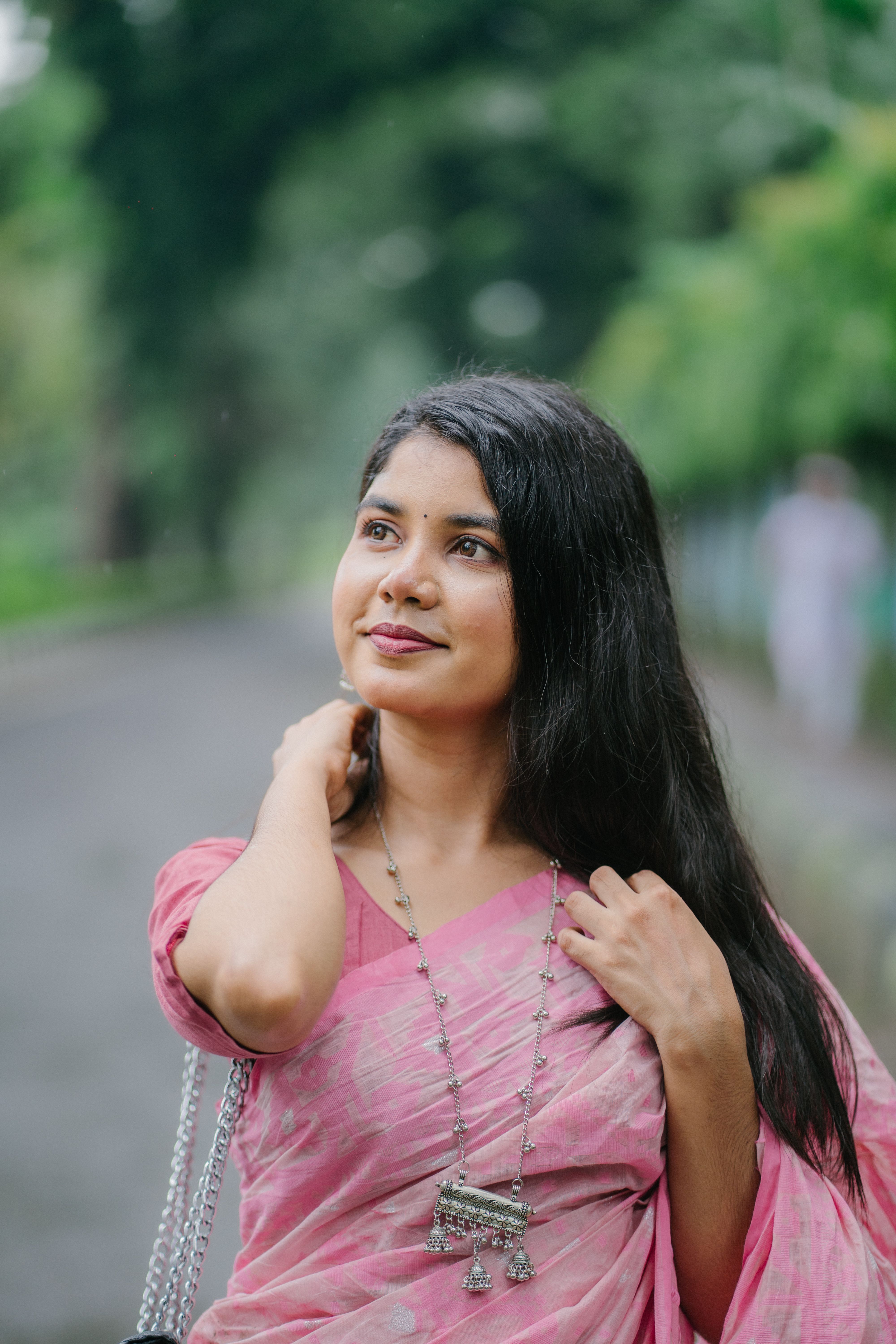 Woman in Traditional Pink Saree Outdoors · Free Stock Photo