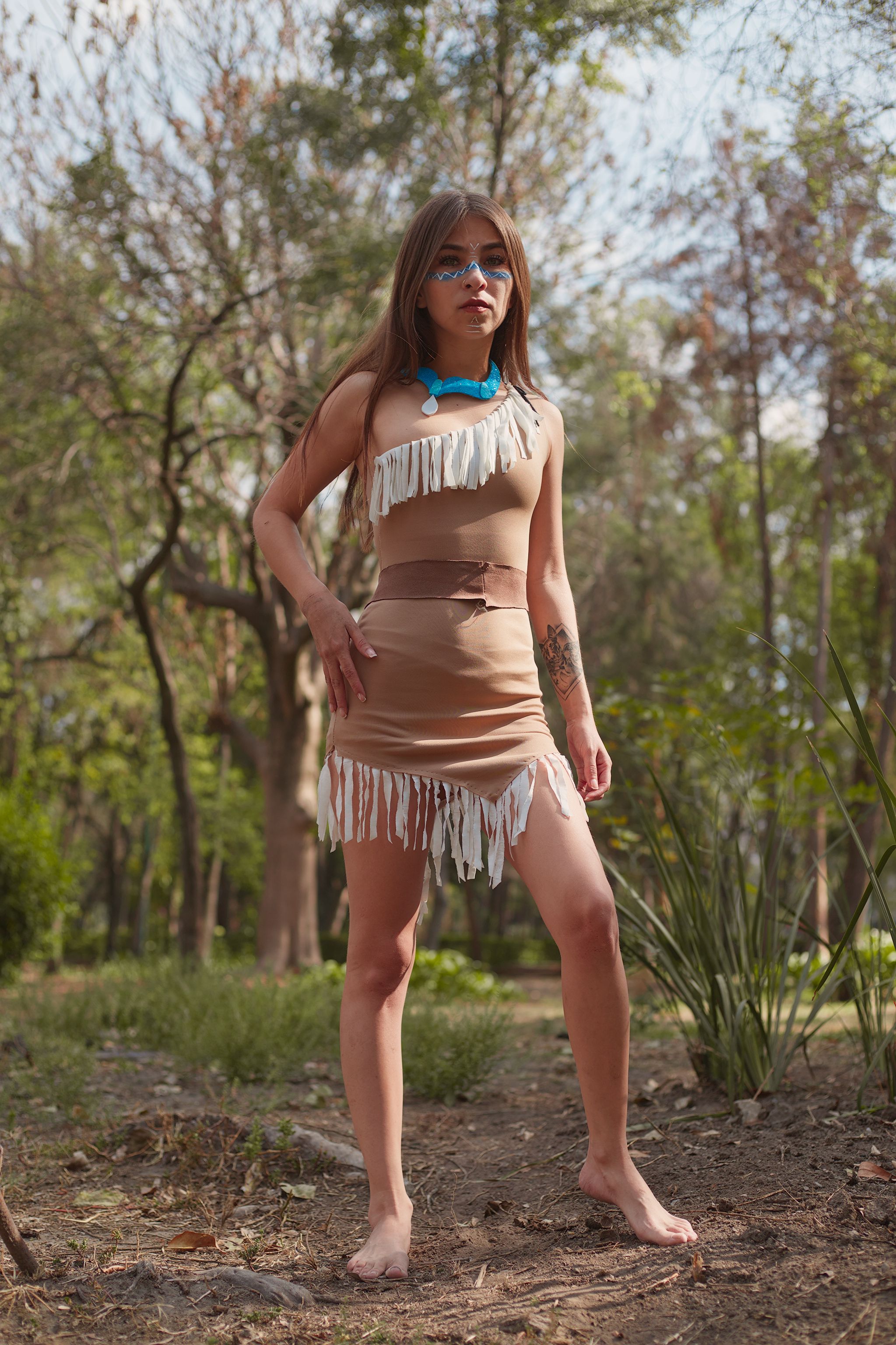 Young Woman Posing in Nature with Fringe Dress · Free Stock Photo