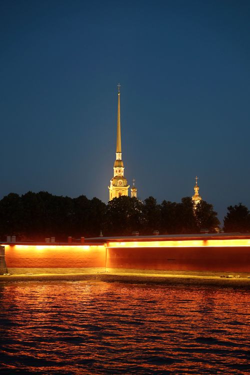 Free Dusk at St. Petersburg with glowing fortress and clear night sky. Stock Photo