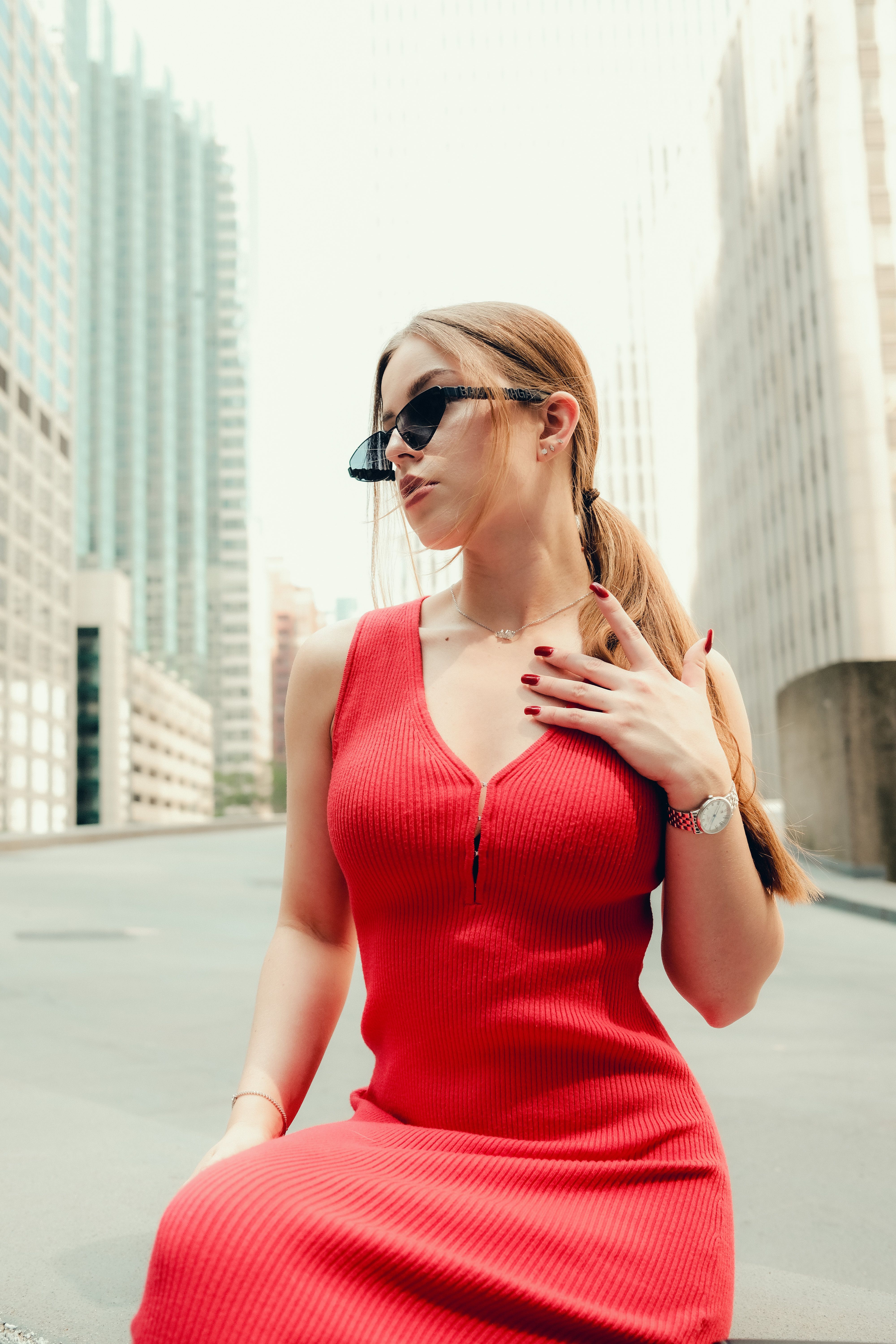 Stylish Woman in Red Dress Posing Outdoors · Free Stock Photo