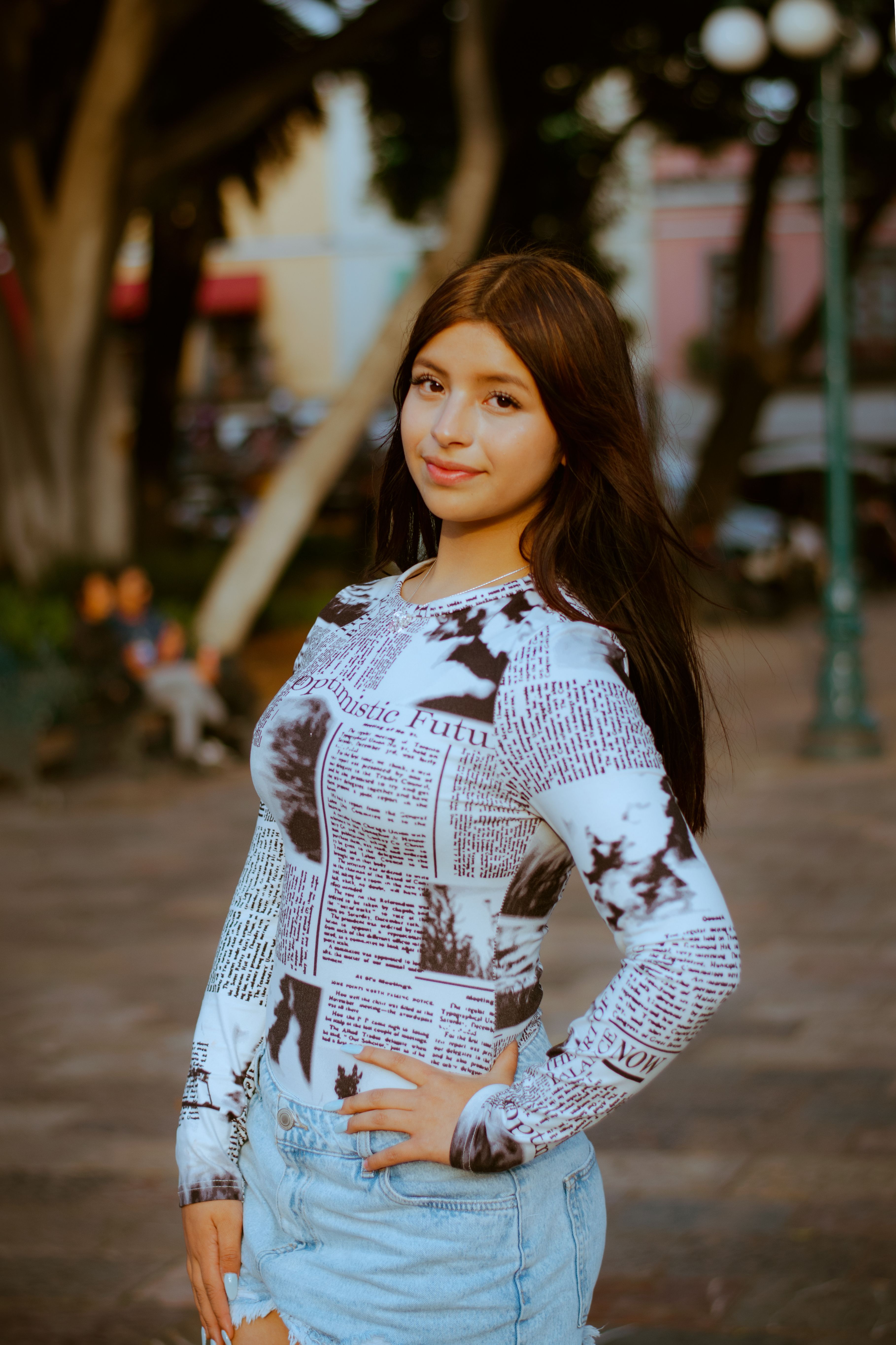 A fashionable young woman poses confidently in Puebla's historic center.