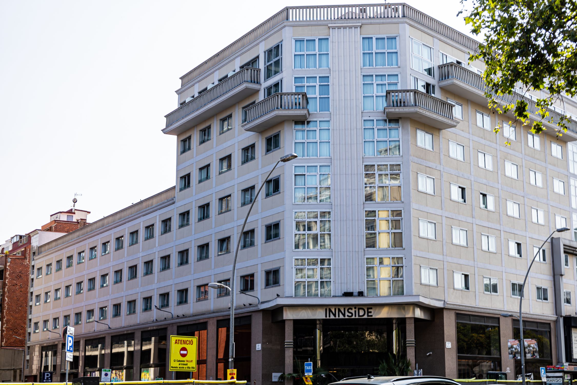 Corner view of a modern hotel building in Barcelona, showcasing urban architecture