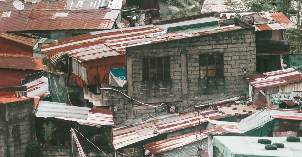 Slum Rectangular Photo Aerial View of Urban Slum Area with Tin Roofs · Free Stock Photo
