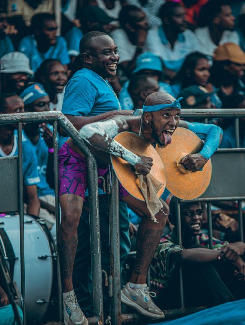 Free Energetic crowd in Burundi celebrating with music and dance. Colorful and joyful atmosphere. Stock Photo