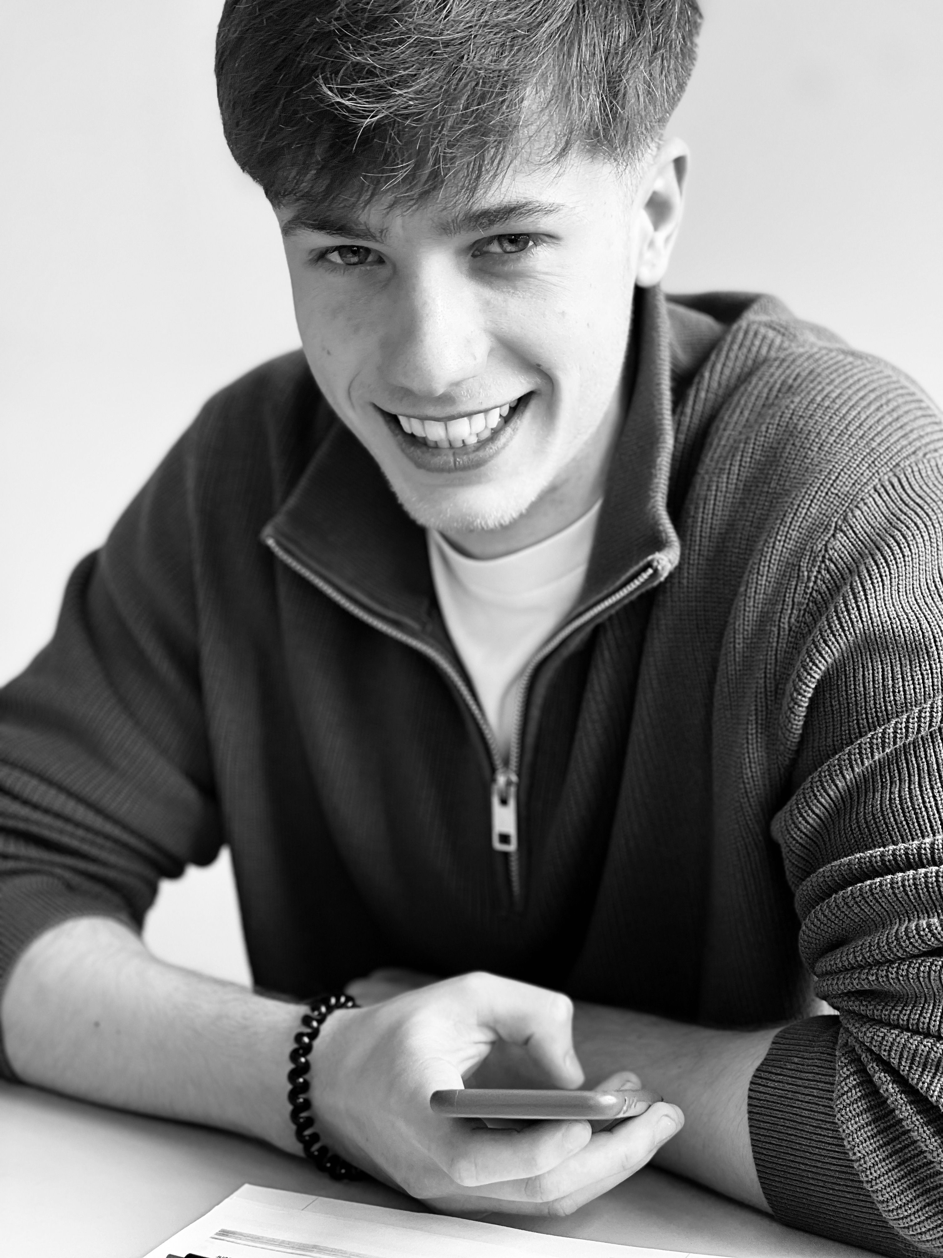 Black and White Portrait of Smiling Young Man · Free Stock Photo