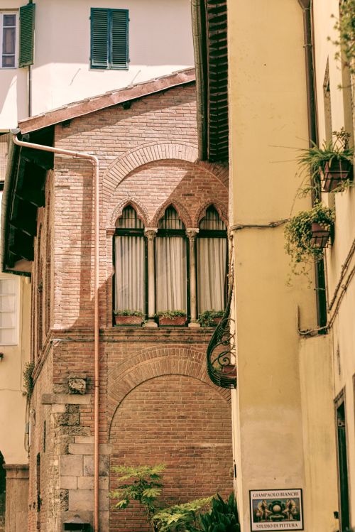 Free Explore the rustic medieval charm of Lucca's historic architecture in Tuscany, Italy. Stock Photo