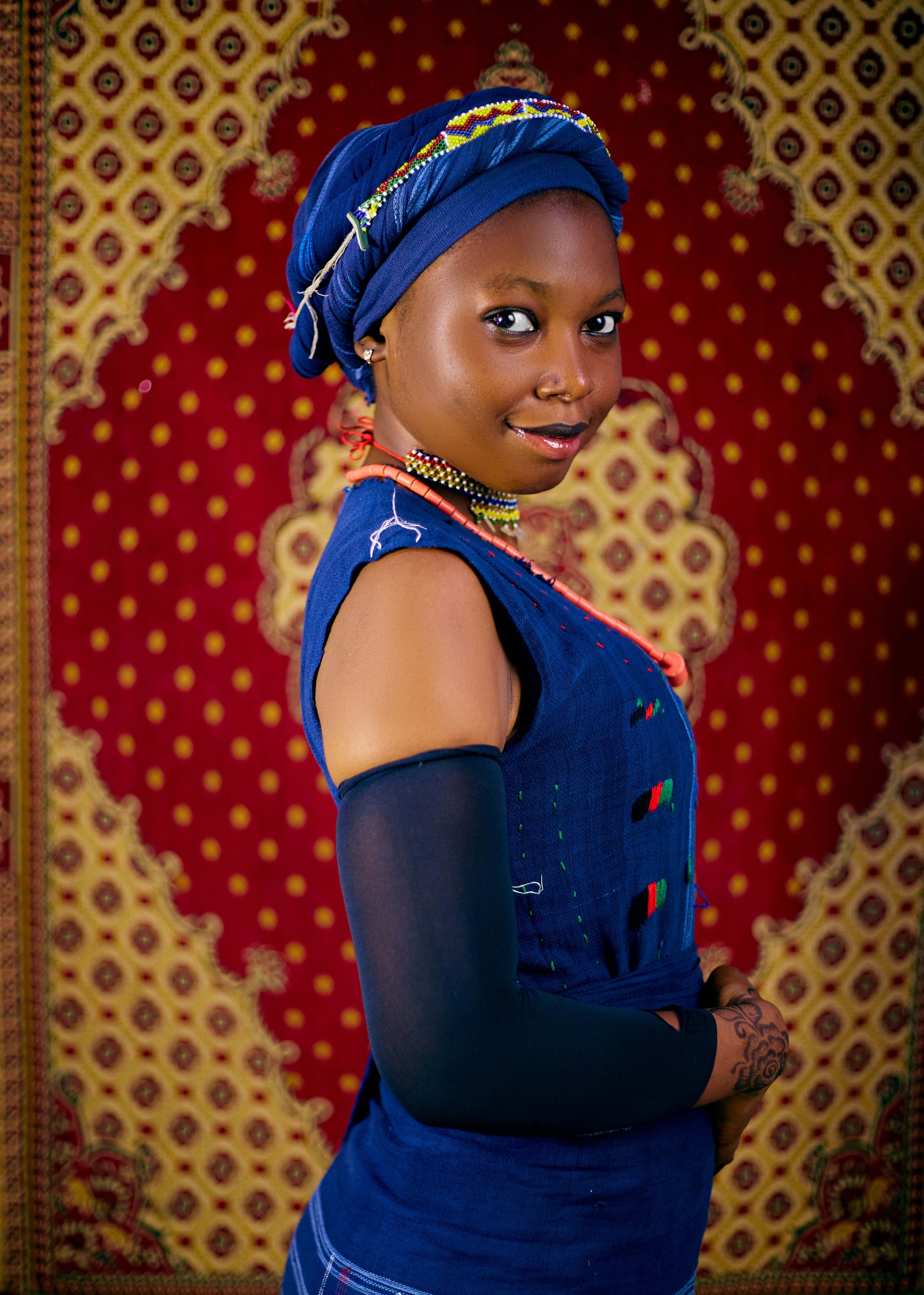 Elegant Portrait of a Young Woman in Traditional Dress · Free Stock Photo