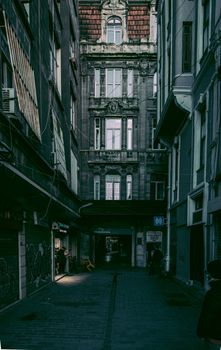 Discover the architectural beauty of a historical alleyway in Istanbul, captured in twilight.