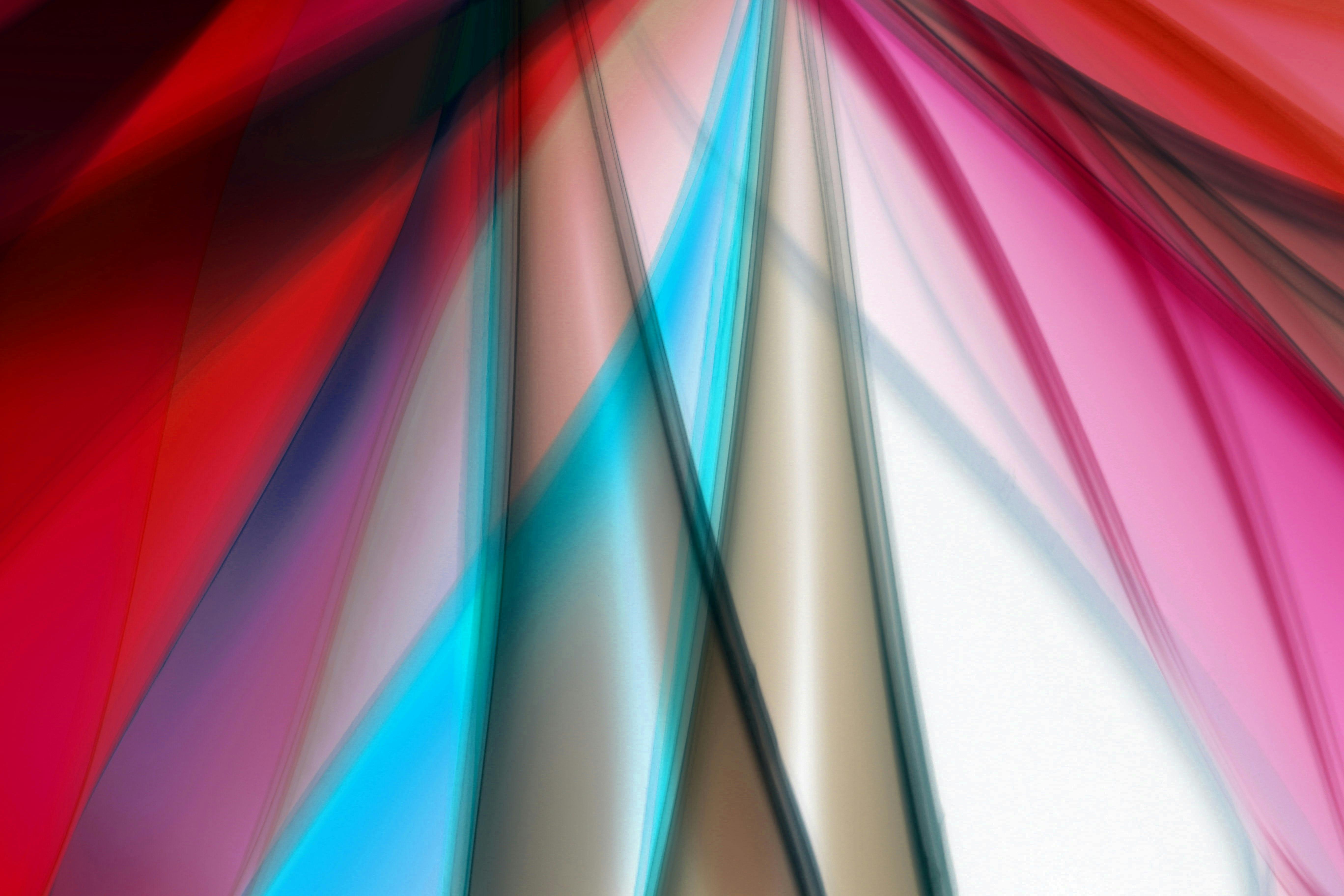 Gratis Arte abstracto vibrante con colores fluidos y formas dinámicas, creando una sensación de movimiento y energía. Foto de stock