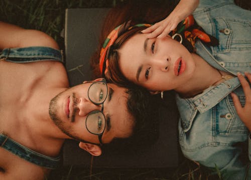 Man Lying Down Beside Woman