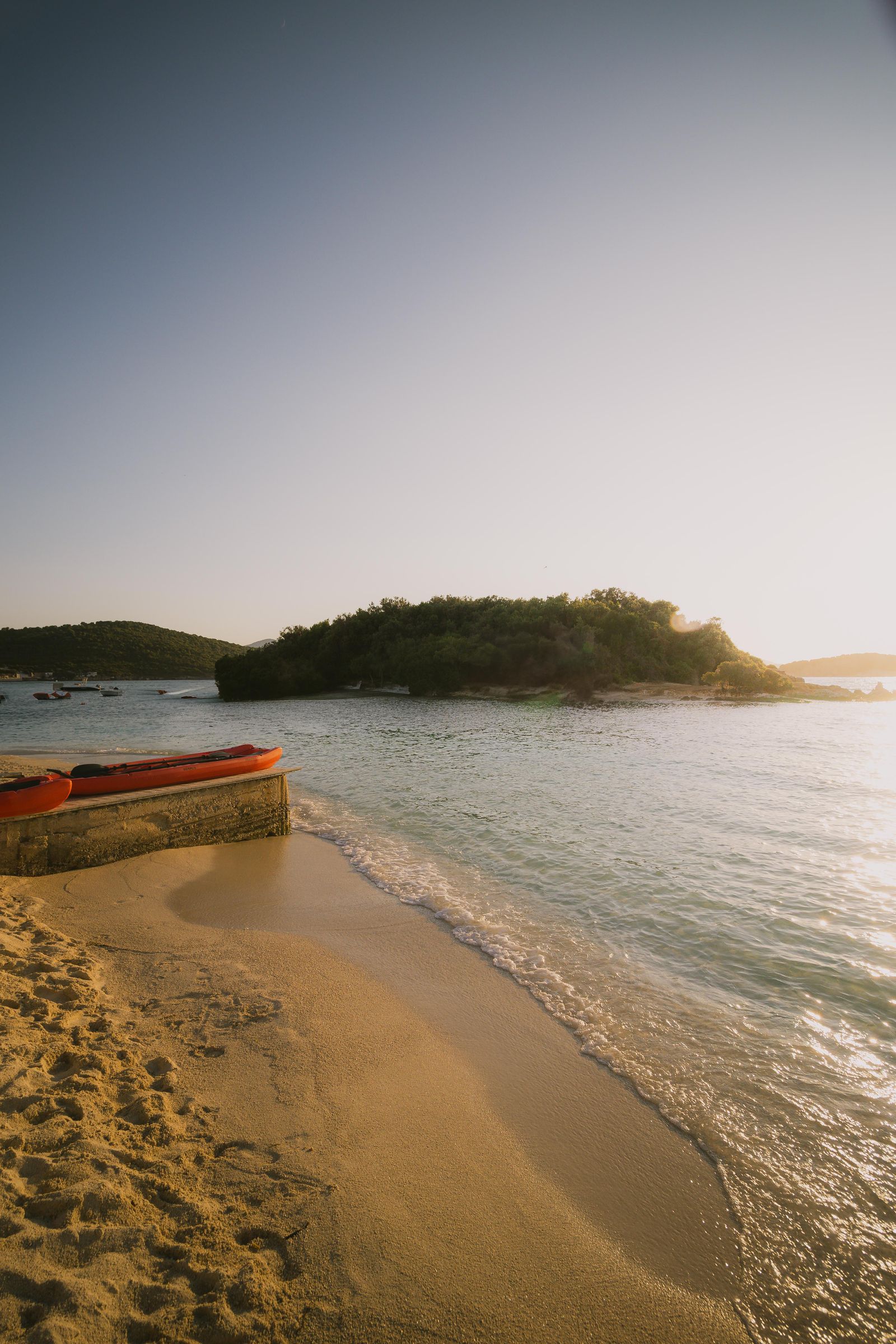 Calm sunset over the sea and islands at Ksamil on the Albanian Riviera