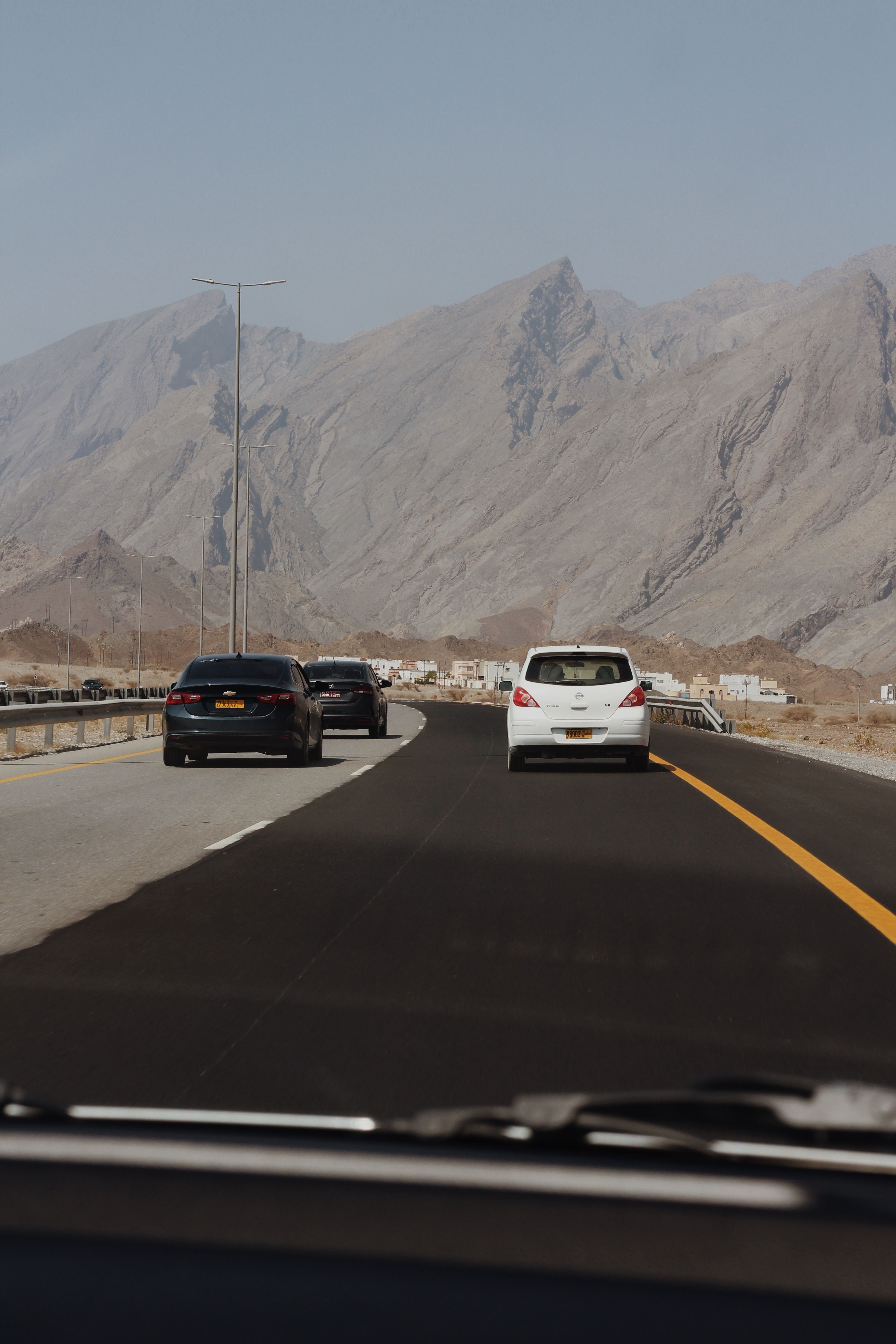 Scenic Mountain Highway Drive in Arid Landscape · Free Stock Photo