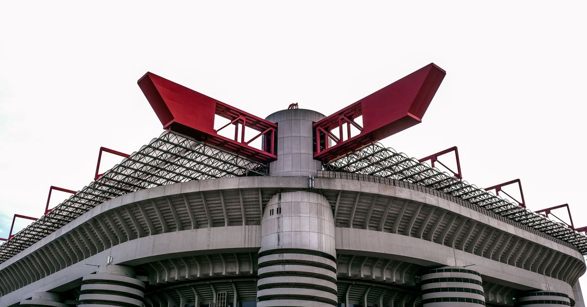 Close-up view of the iconic San Siro Stadium in Milan, showcasing its unique architecture.