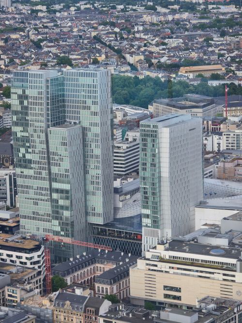 Free High-angle shot of modern skyscrapers amidst a dense urban cityscape, perfect for architecture and city life themes. Stock Photo
