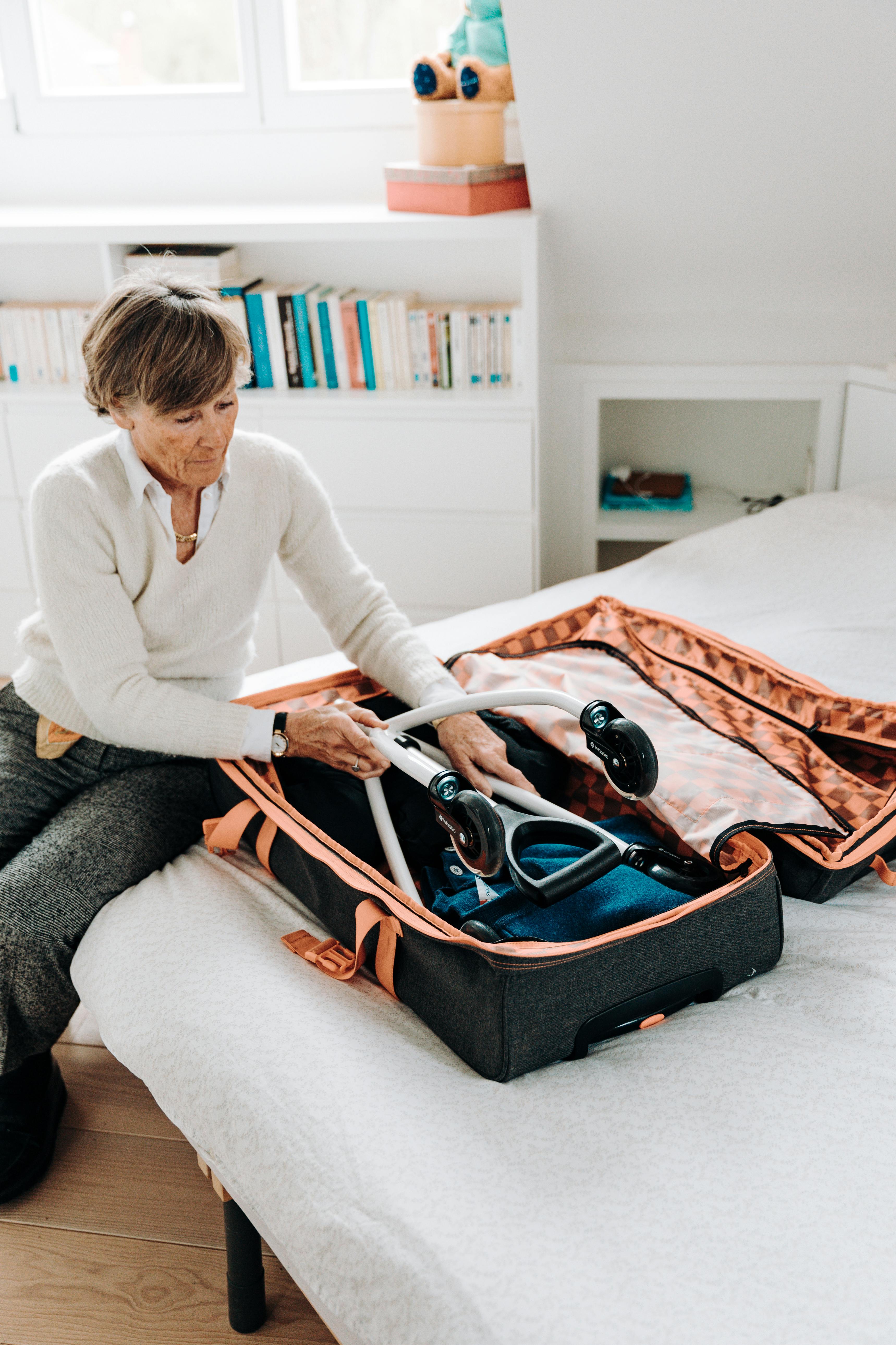 Woman on mobility scooter in park setting