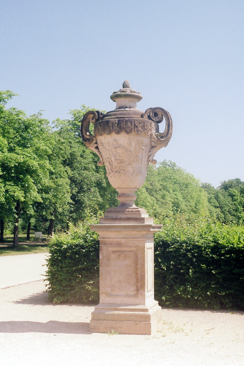 Free A beautiful stone vase in a historic Dresden park showcasing Baroque elegance. Stock Photo