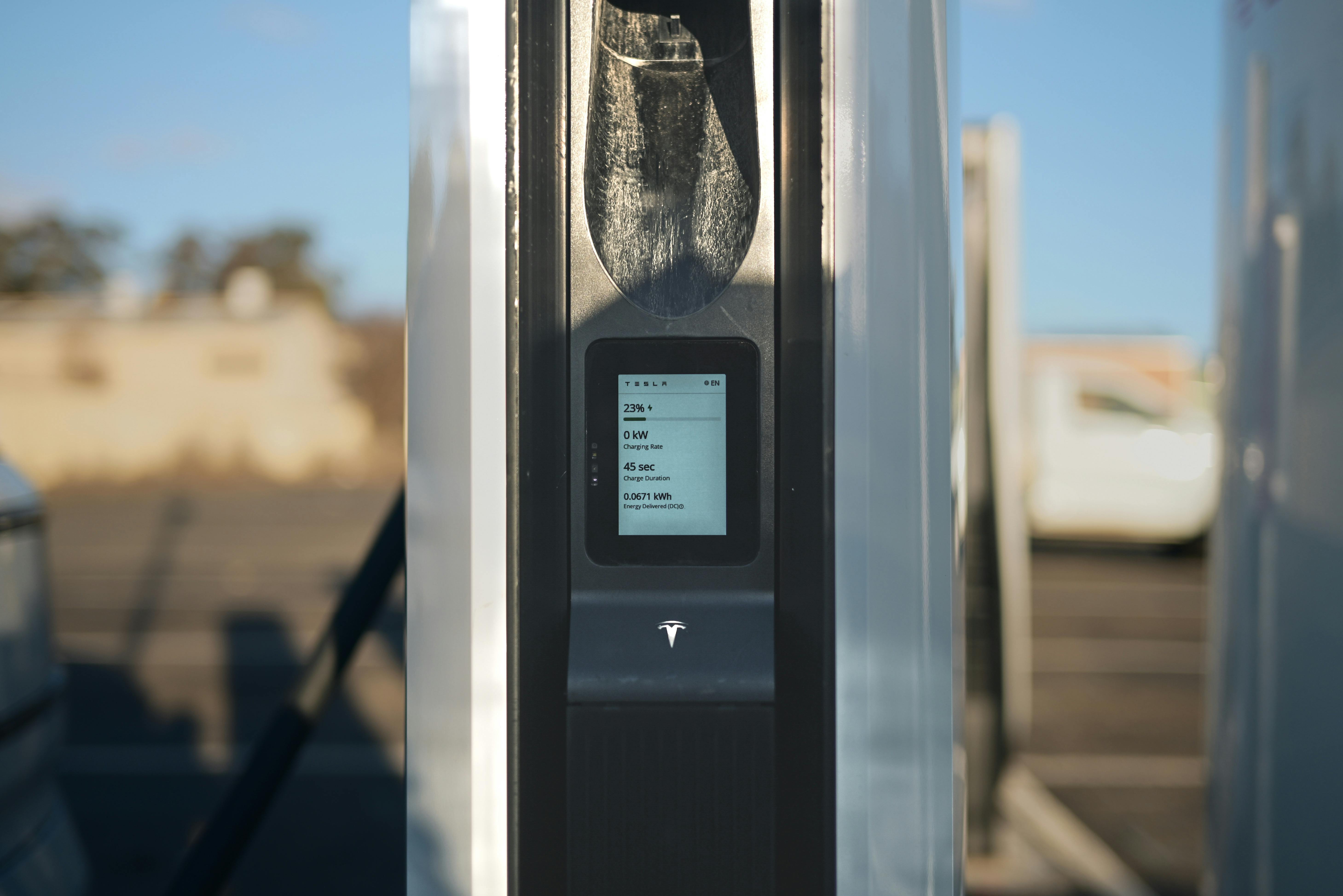 Image Name close-up of an EV Charger at a charging station