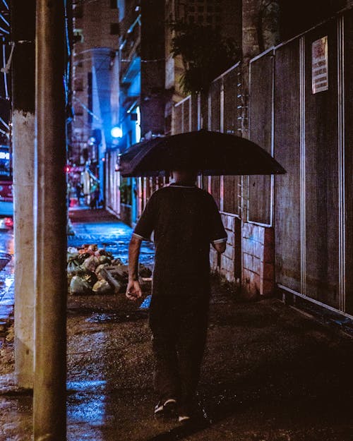 Man Holding Umbrella