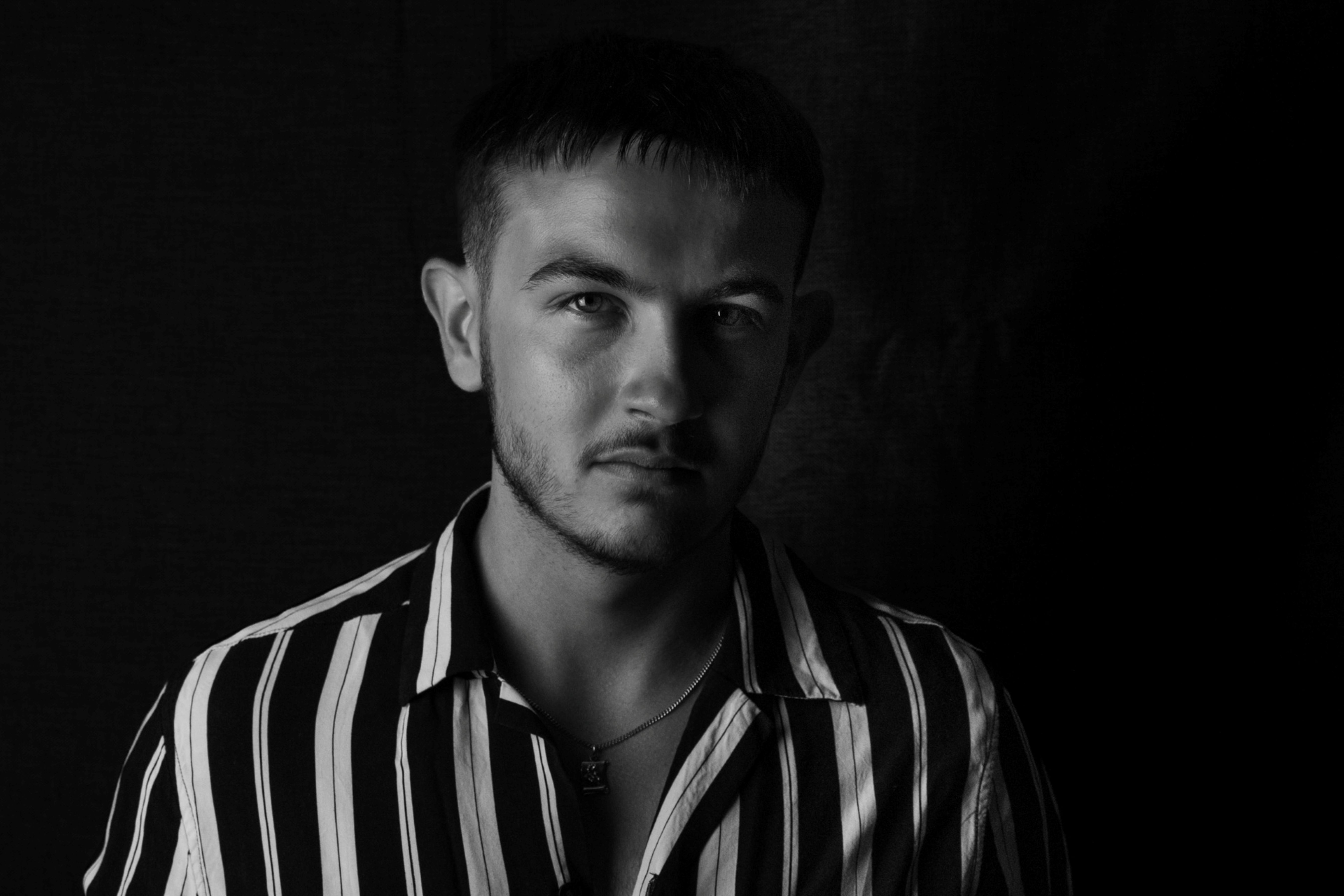 Black and White Portrait of a Young Man · Free Stock Photo