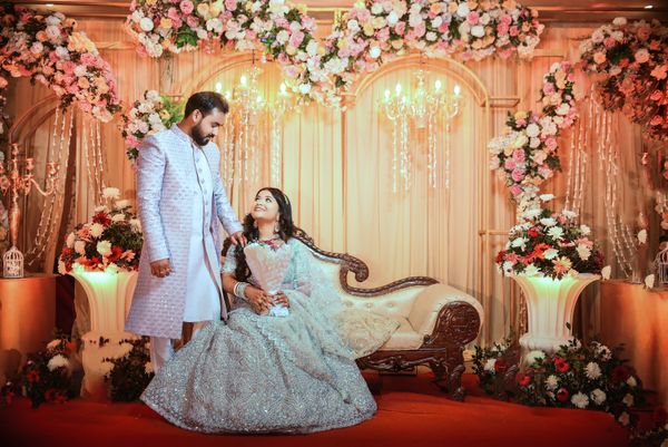 Indian wedding reception with traditional bride and groom