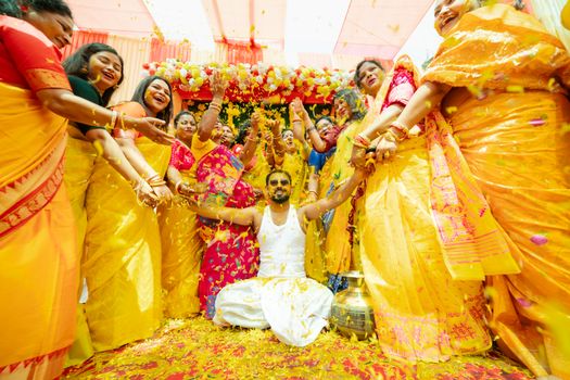 Joyful moments from a vibrant Haldi ceremony in Kolkata, India.