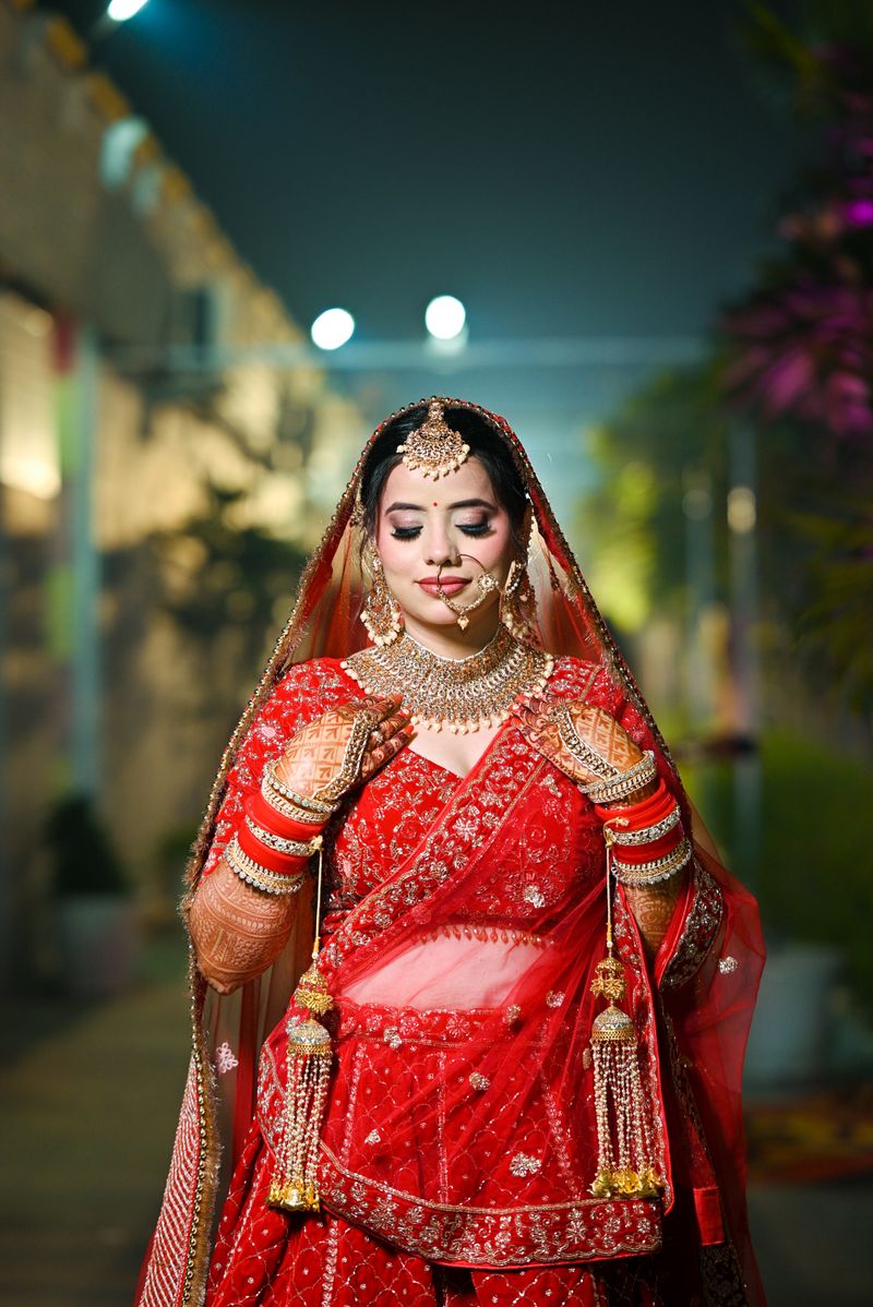 Elegant Indian Bride in Traditional Red Lehenga · Free Stock Photo