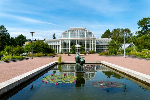 Free A picturesque summer view of Kaisaniemi Botanic Garden's greenhouse in Helsinki, Finland. Stock Photo