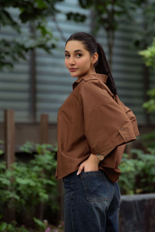 Stylish Woman Posing Outdoors in Tehran's Urban Setting · Free Stock Photo