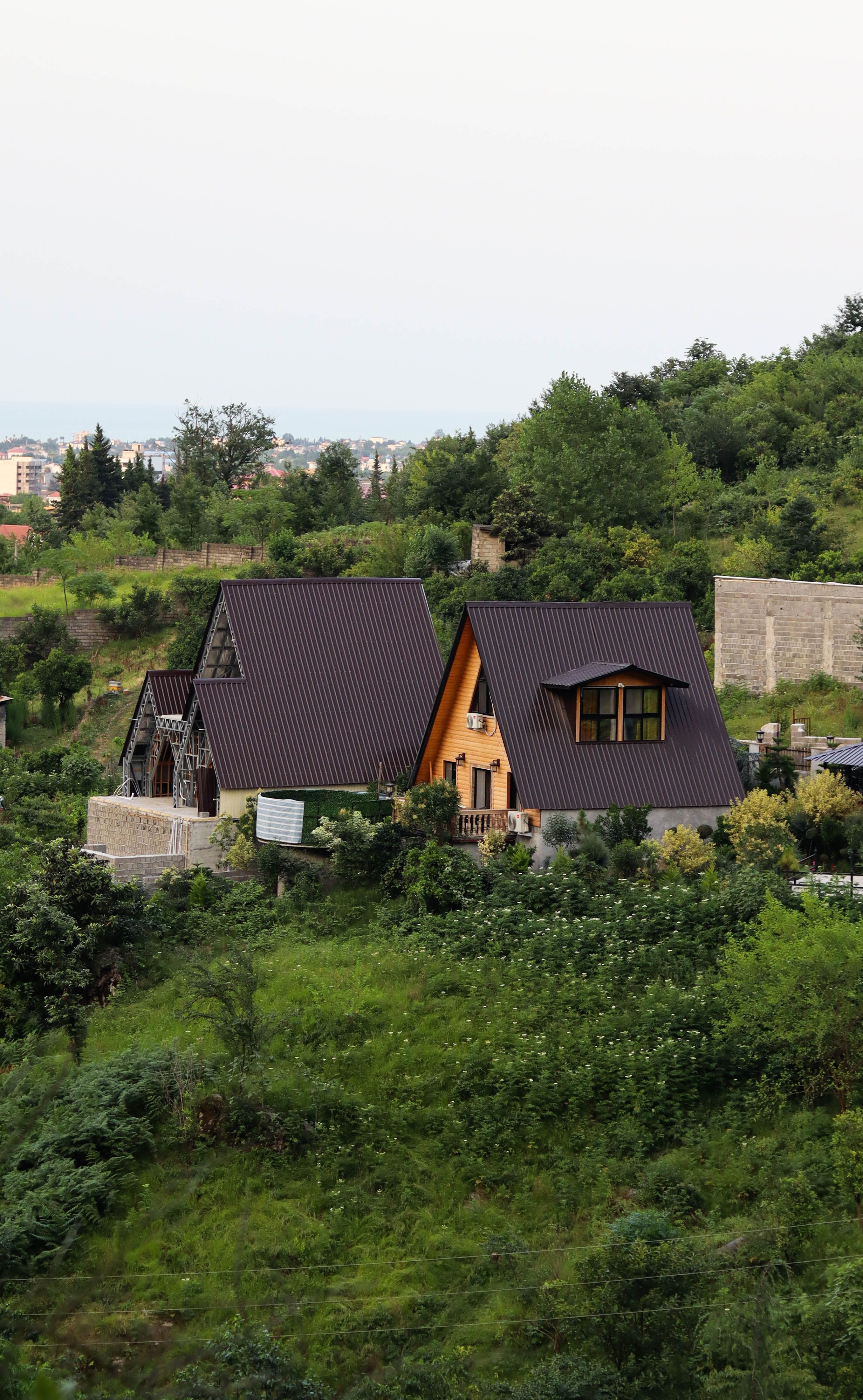 Charming A-frame House in Lush Greenery · Free Stock Photo