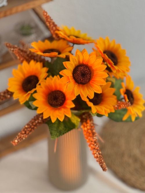 Free A vibrant arrangement of sunflowers in a vase, perfect for any room. Stock Photo