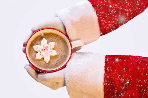 Free Person Holding Cup of Hot Chocolate Stock Photo