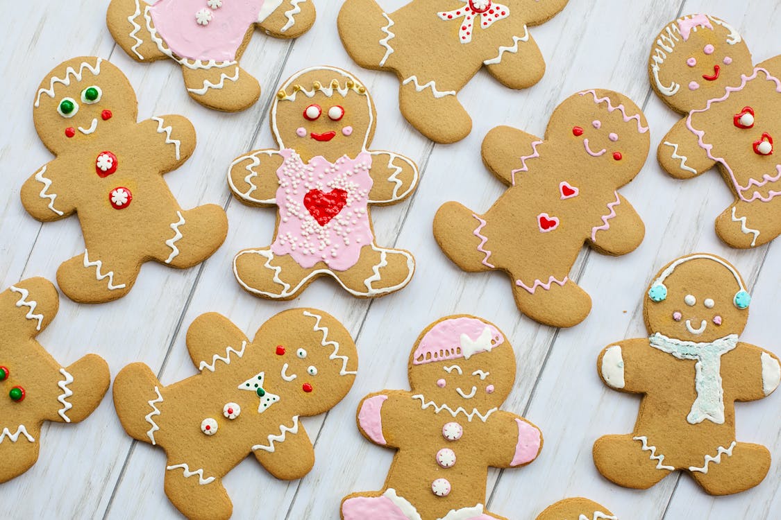 Top View Of Gingerbread Cookies Laid Flat On A Wooden Table