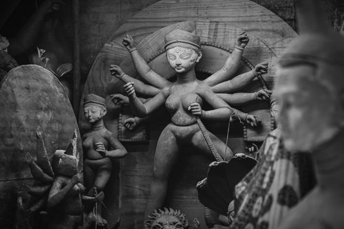 Free Black and white image of Durga idol crafting in Kumartuli, Kolkata, a vibrant hub of artistry. Stock Photo