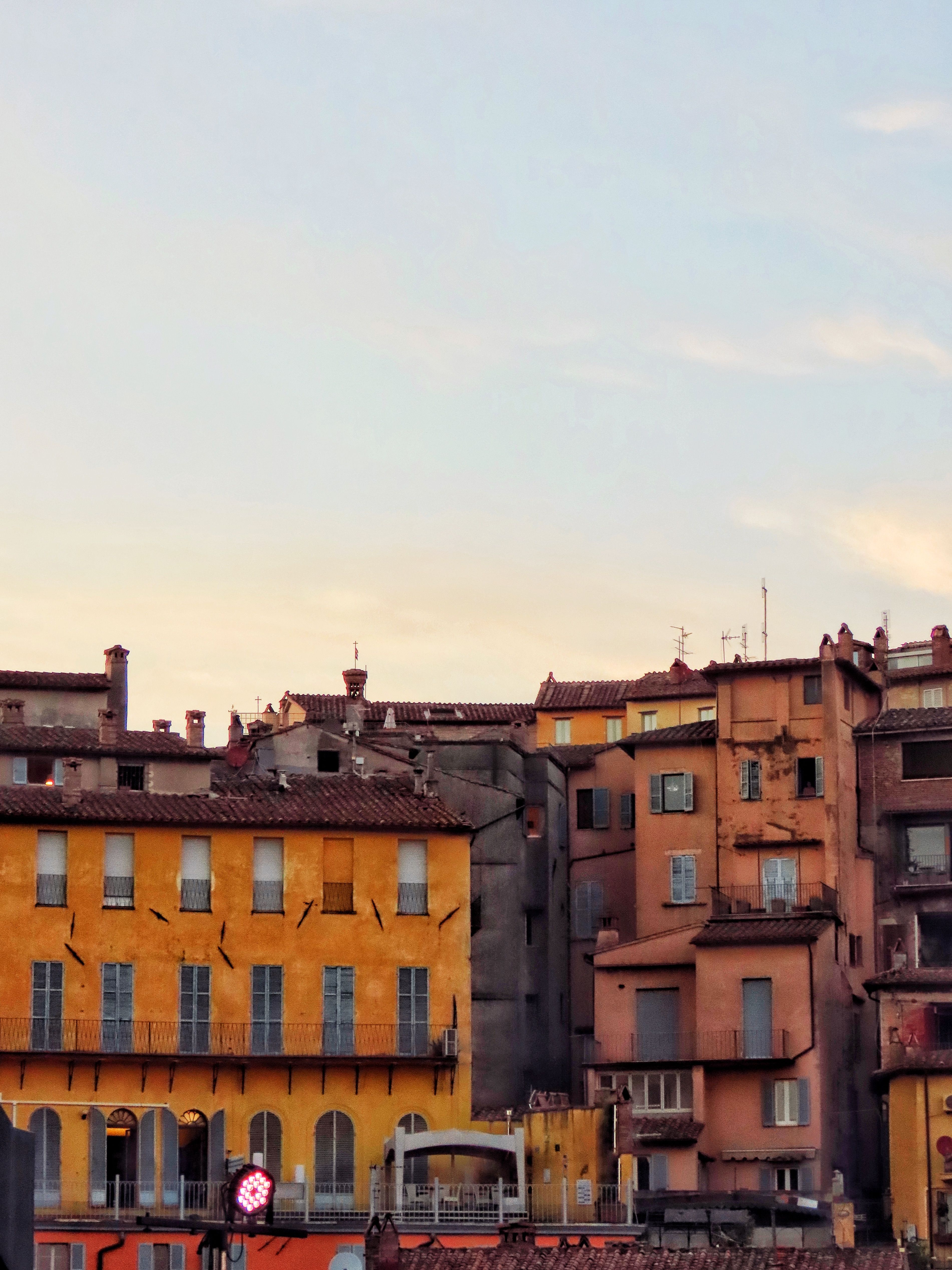 Charming Sunset over Rustic Italian Buildings · Free Stock Photo
