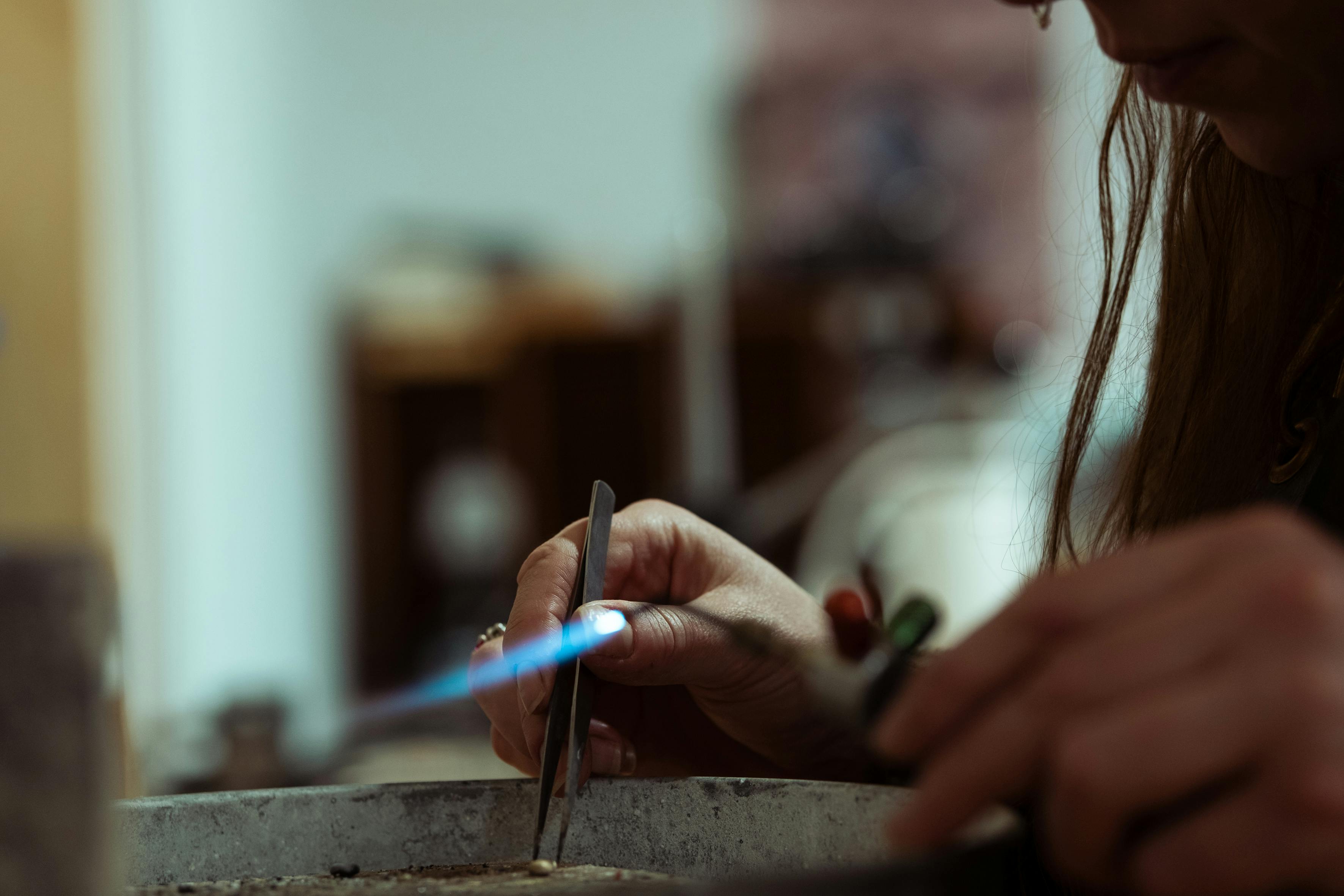 jeweler's hands soldering - Jewelry repair Scottsdale AZ