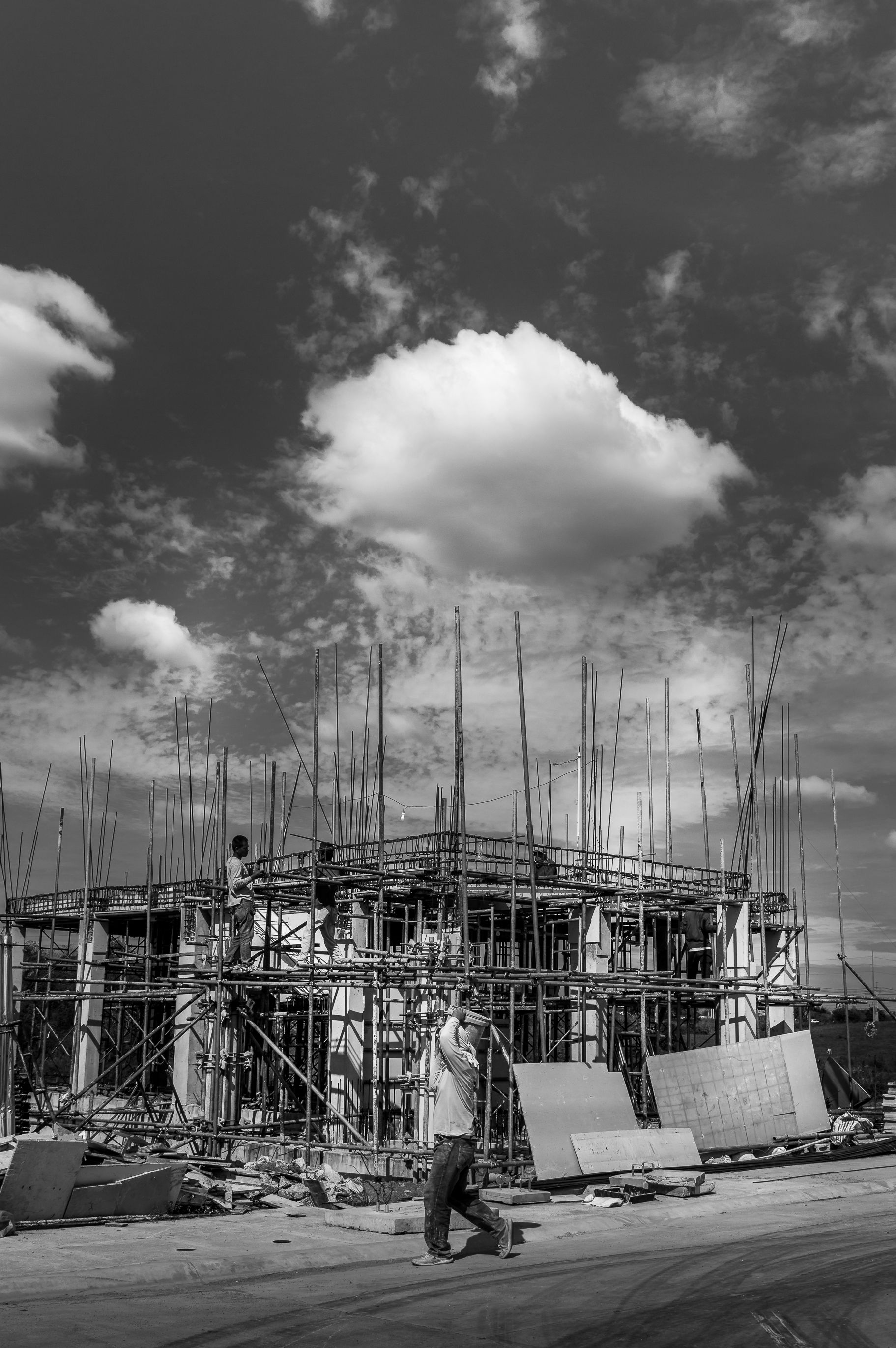 Black and White Construction Site with Worker · Free Stock Photo