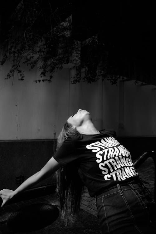 Free Monochrome Photo Of Woman Wearing Black Printed Shirt Stock Photo