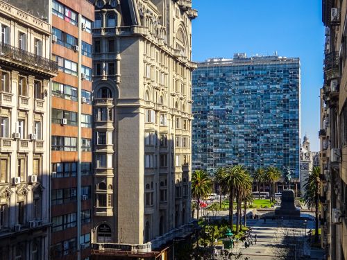Free Stunning architectural perspective of a city square in Montevideo with historic and modern buildings. Stock Photo