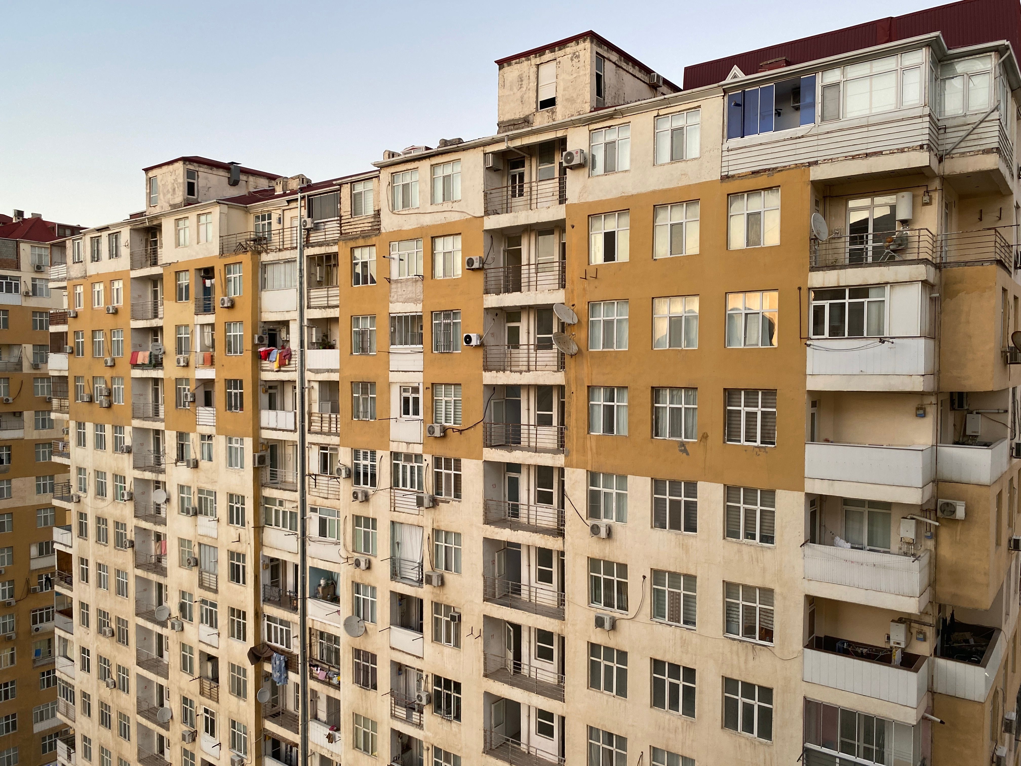 View of Urban Apartment Building at Sunset · Free Stock Photo