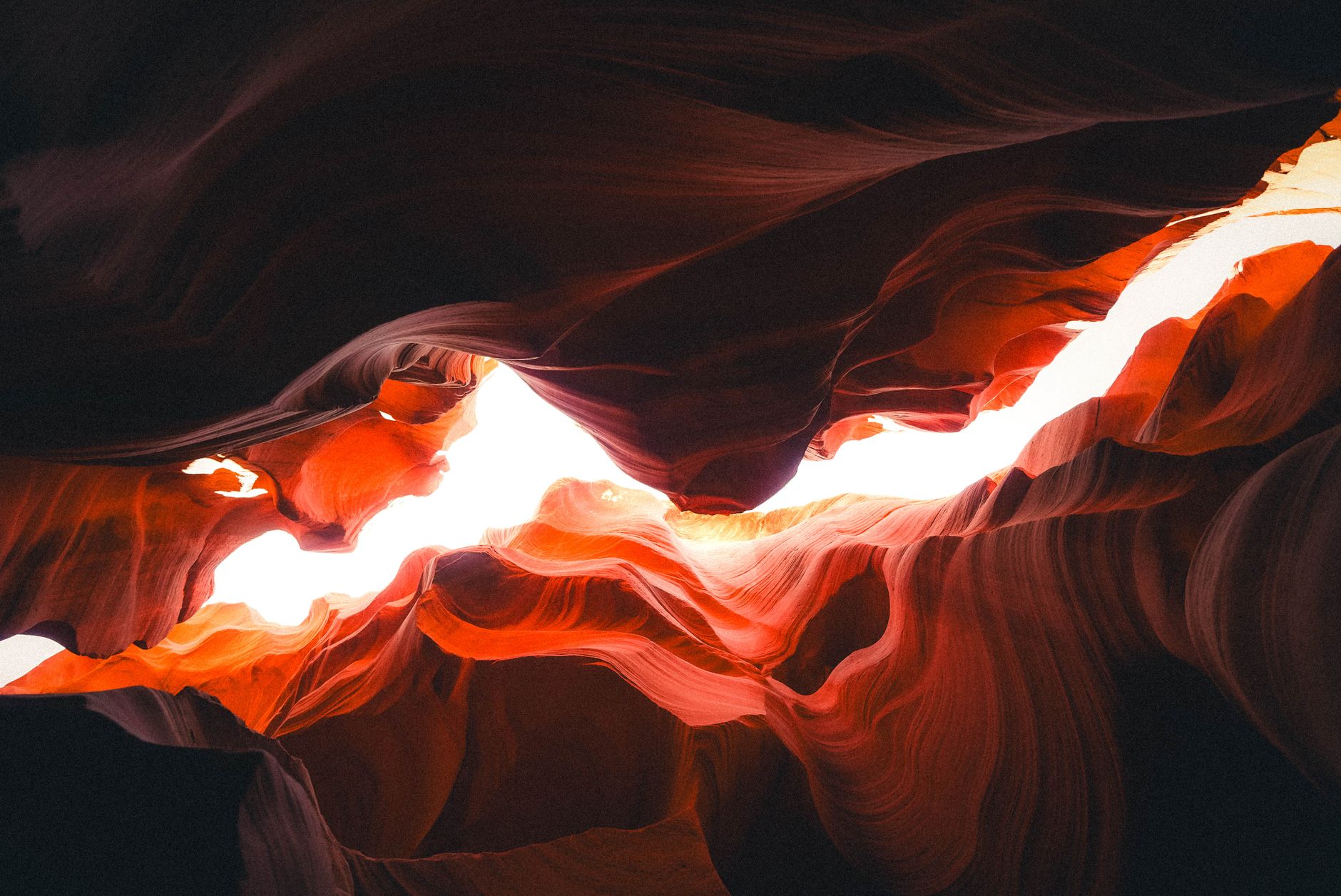 Explore the striking red sandstone curves and natural light of Arizona's iconic Antelope Canyon.