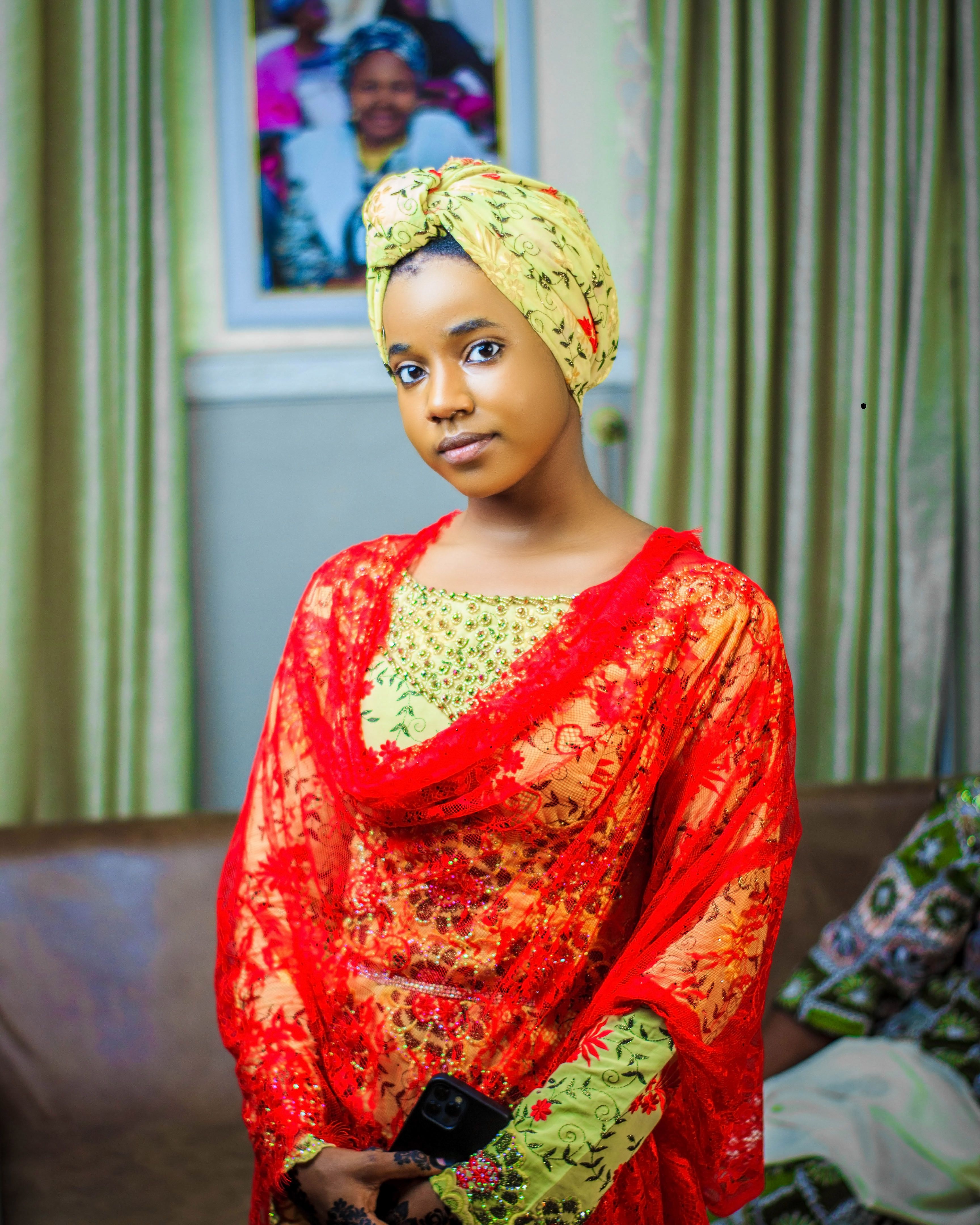 Young Woman in Traditional Red Embroidered Attire · Free Stock Photo