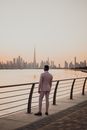 Photo Of Man Standing Near Handrails