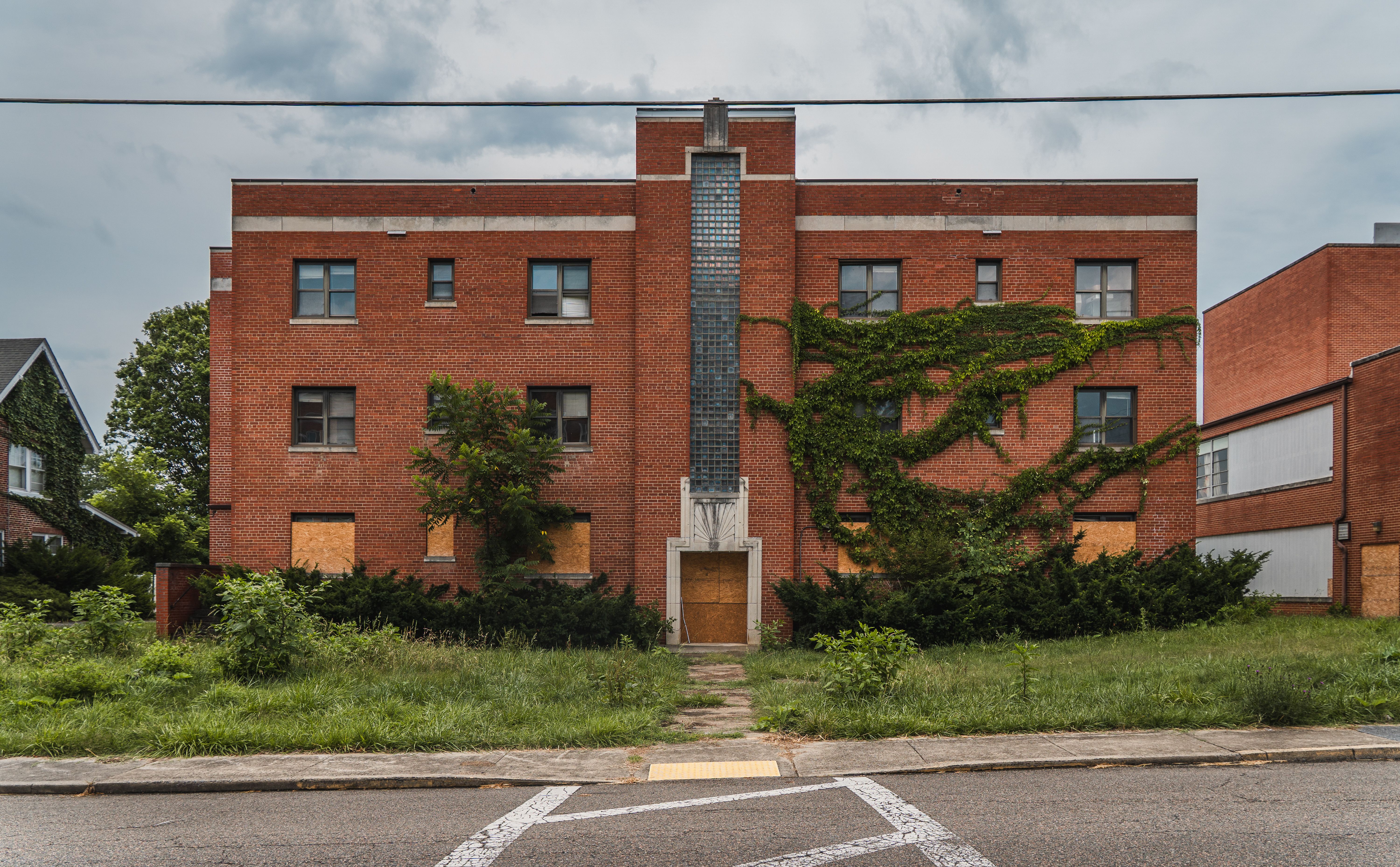 Abandoned Brick Building Overgrown with Ivy · Free Stock Photo