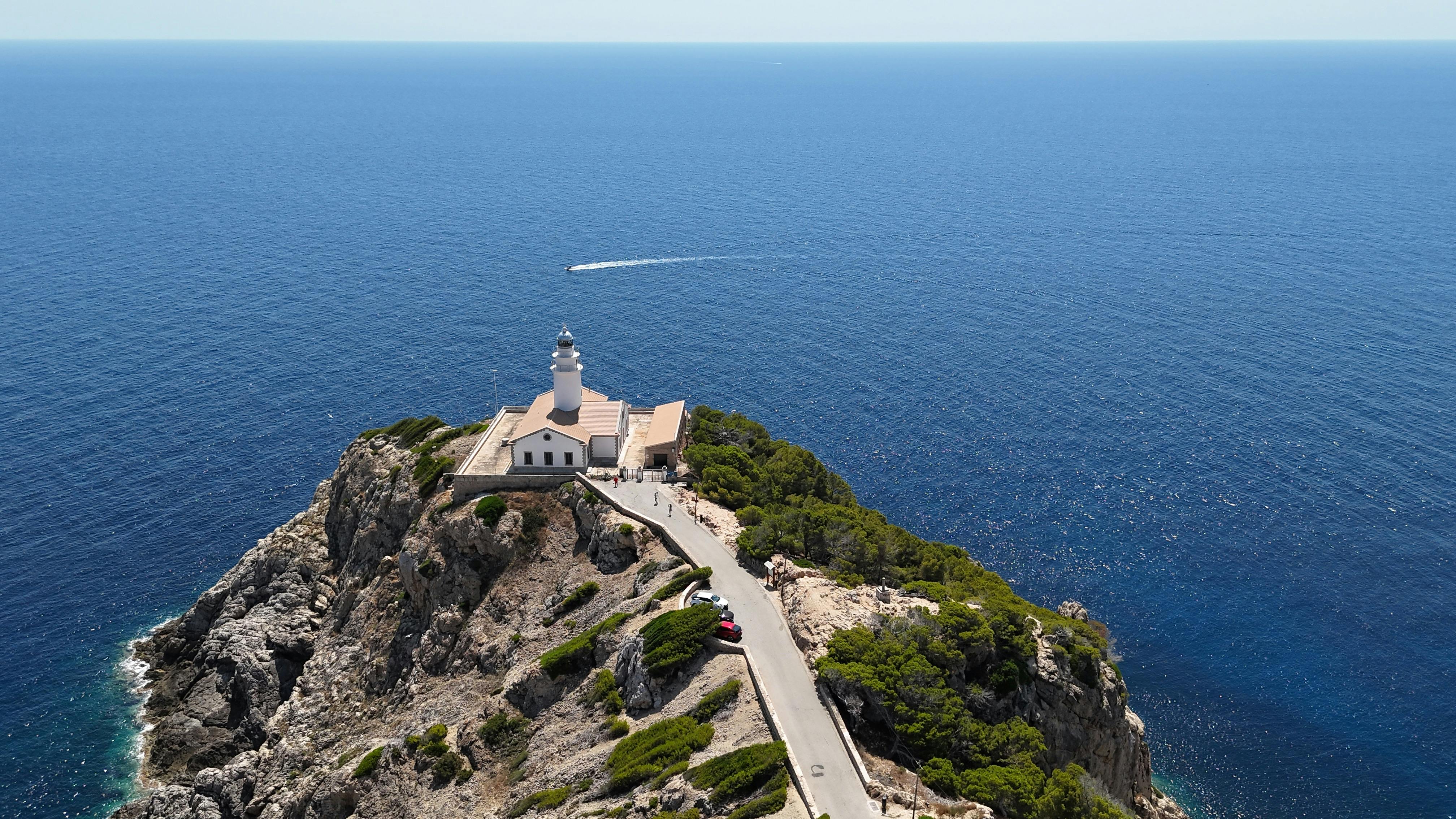 Aerial View of Capo Sandalo Lighthouse on the Italian Island of San Pietro  · Free Stock Photo, image size:4032x2268